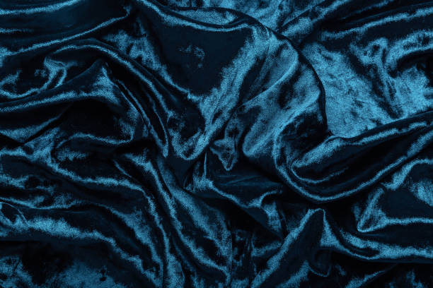 голубая бархатная ткань - бархат стоковые фото и изображения
