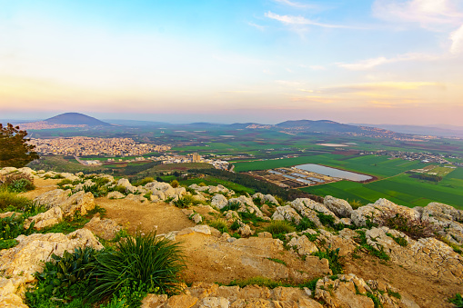 Sunset view of the Jezreel Valley and Mont Tabor, from Mount Precipice. Israel