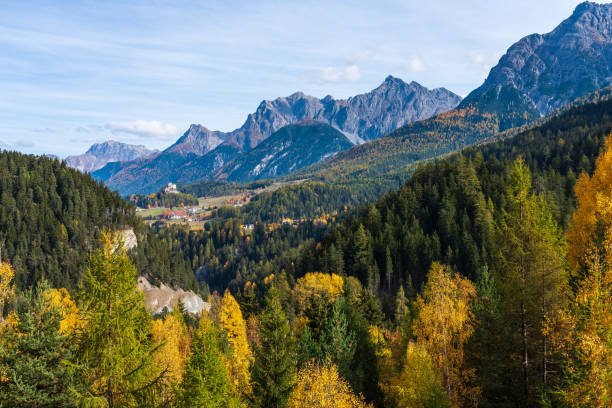 the village of ardez, graubunden in switzerland - castle engadine alps lake water imagens e fotografias de stock