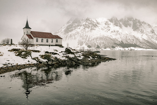 Sildpollnes Church at Sildpollneset in the Austnesfjorden in winter in the Lofoten in Norway