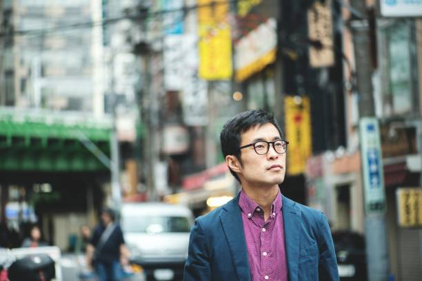 istock Street portrait of smartly dressed man 1130657125