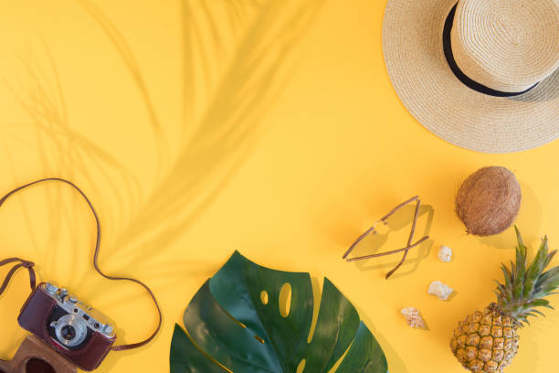 istock Straw hat,sunglasses and beach slippers on wood 1130659868