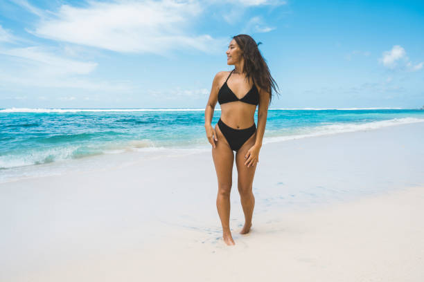 istock Young woman having fun at seaside 1130660746