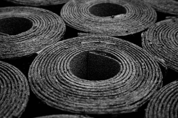 roofing felt. rolls of bitumen - bitumen felt imagens e fotografias de stock