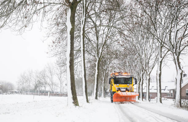 istock truck with snowplow, winter service 1130661025