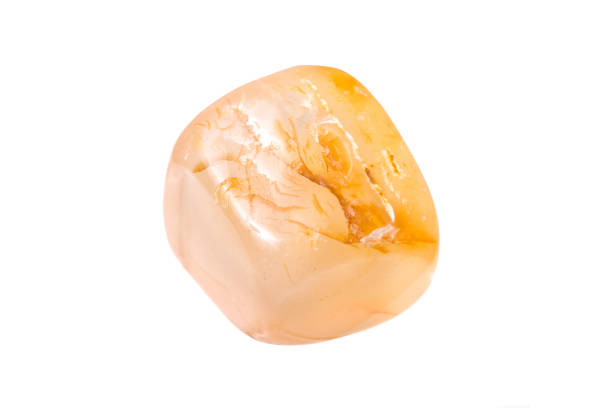 istock orange calcite mineral isolated on white background 1130661239