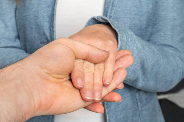 istock Hands touch each other - together, helping, sympathy concept 1130662243