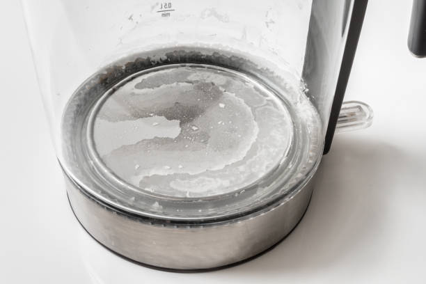 istock Lime scale at the bottom of kettle - hard water concept 1130662523