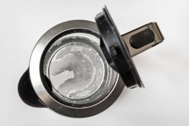 Lime scale at the bottom of kettle - hard water concept