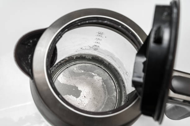 istock Lime scale at the bottom of kettle - hard water concept 1130662574