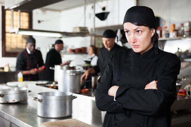 istock Upset female cook in kitchen of restaurant 1130663231