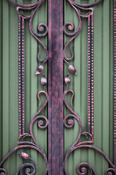 istock beautiful decorative metal elements forged wrought iron gates 1130666720