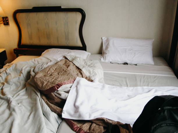 istock Cluttered bedroom in hotel 1130666745
