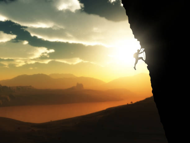 istock 3D extreme rock climber against a sunset landscape 1130666814