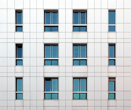 Detail of a modern white aluminium cladding ventilated facade.