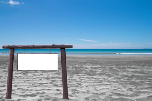 istock signboard on tropical beach with blue sky background 1130670192