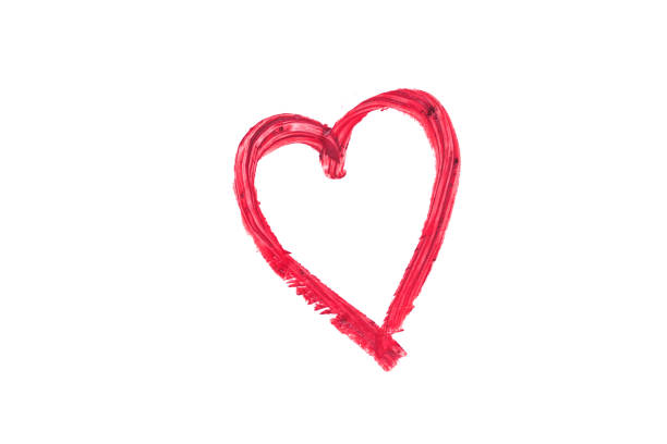 Heart drawn with color lipstick isolated on white. Love concept.