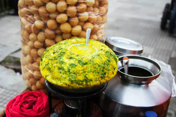 Close-up of pani puri stall, typical Indian snack, Pune, Maharashtra