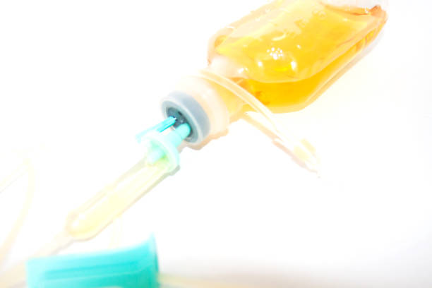 istock Close up saline solution drip for patient and infusion pump in hospital 1130671932