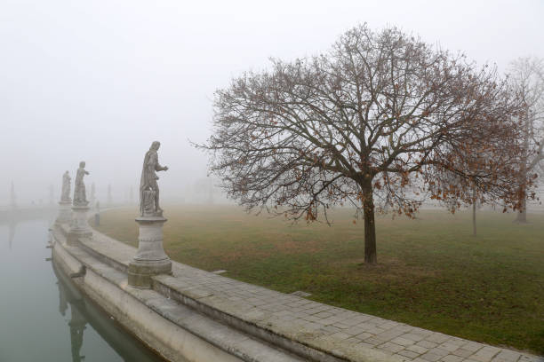 Padua, Italy, 19 February 2019: The Prato della Valle stands immersed in the fog of the Padan plain.