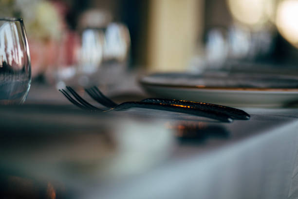 istock Luxury table settings for fine dining with and glassware, beautiful blurred  background. For events, weddings. 1130674977