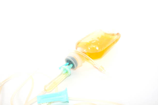 istock Close up saline solution drip for patient and infusion pump in hospital 1130674999