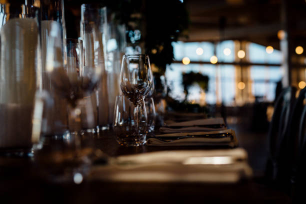 istock Luxury table settings for fine dining with and glassware, beautiful blurred  background. For events, weddings. 1130675508