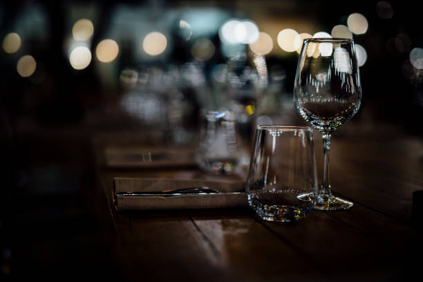 istock Luxury table settings for fine dining with and glassware, beautiful blurred  background. For events, weddings. 1130676230