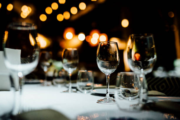 istock Luxury table settings for fine dining with and glassware, beautiful blurred  background. For events, weddings. 1130676315