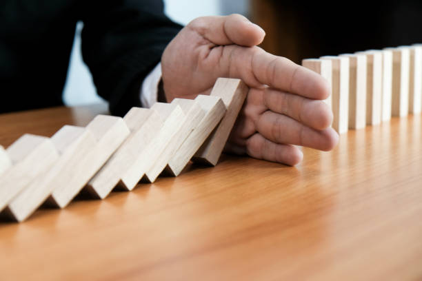 planning risk and strategy in businessman gambling placing wooden block.business concept for growth success process - boundary imagens e fotografias de stock