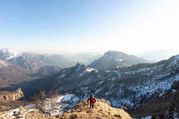 istock Mountain climber going up on the mountain ridge 1130683418