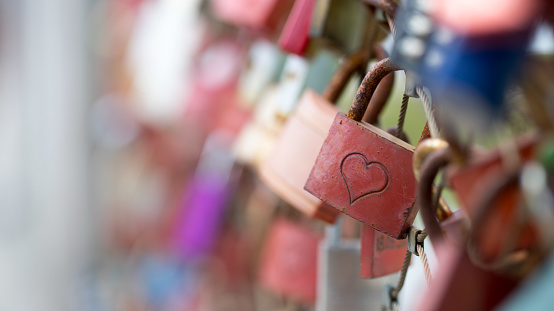Colourful love locks on a bridge