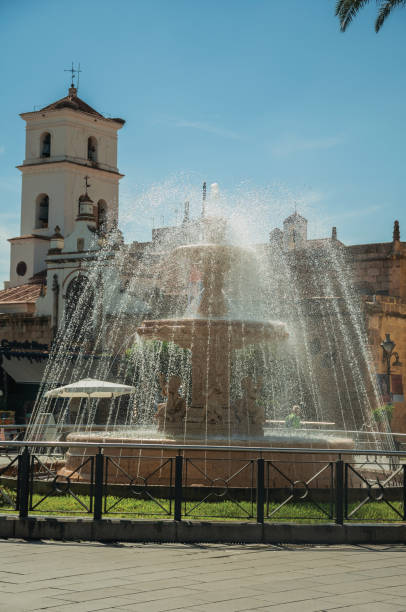 istock Fountain on a square in front of buildings at Merida 1130687080