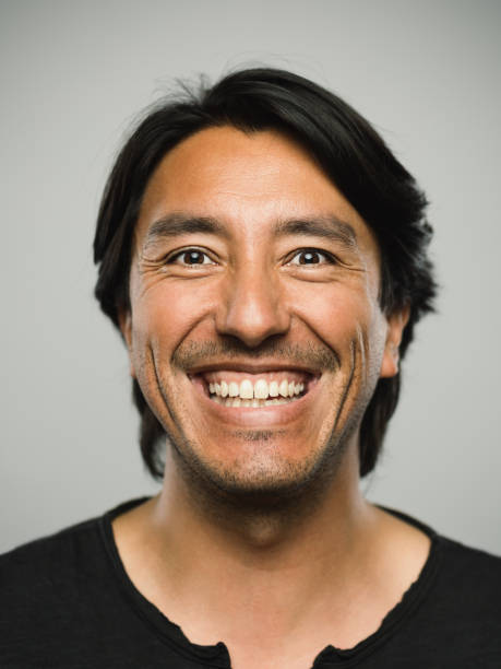 istock Portrait of real hispanic man with excited expression 1130687641