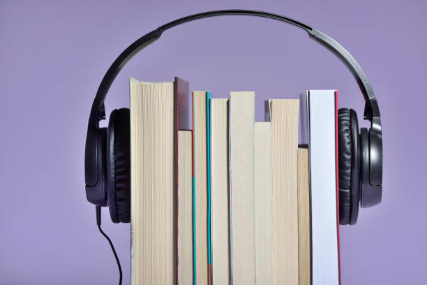 istock Audio books concept with books and headphones 1130687682