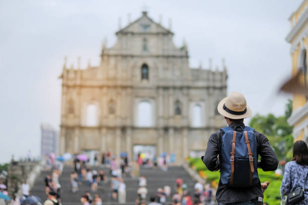 istock Rear View Of Man Standing Against Historic Gate 1130693832