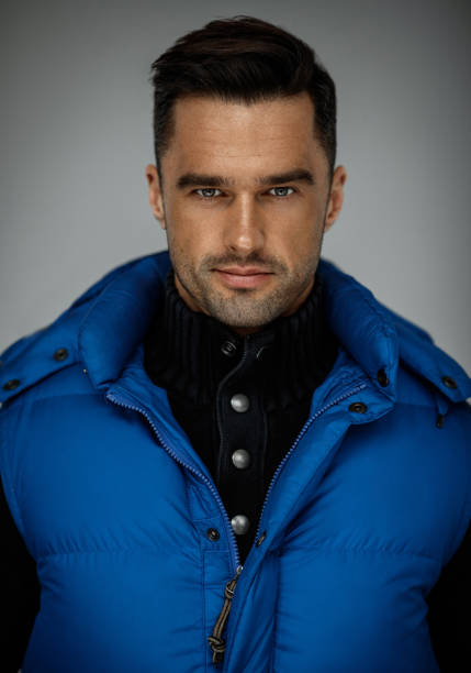 istock handsome man wear blue west isolated 1130693837