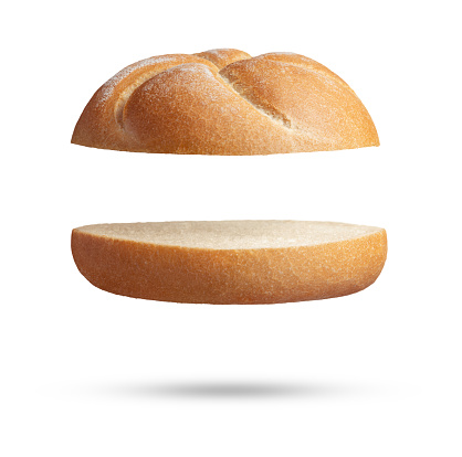 Sliced bun on white. This file is cleaned, retouched and contains clipping path.