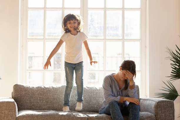 istock Tired stressed mom having headache feeling annoyed about noisy kid 1130696750