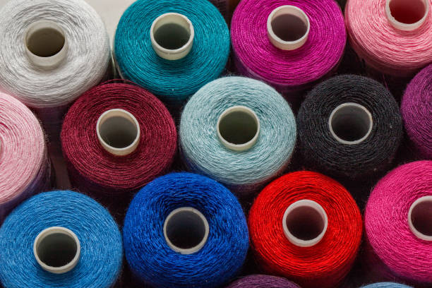istock Top down view of sewing threads in a multitude of bright colours 1130698703