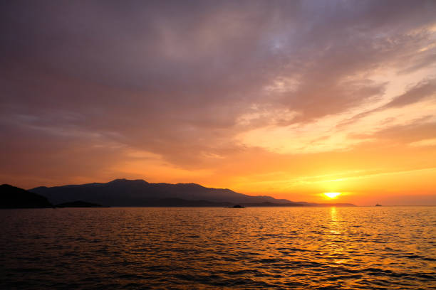 istock beautiful sunset over the sea 1130699402