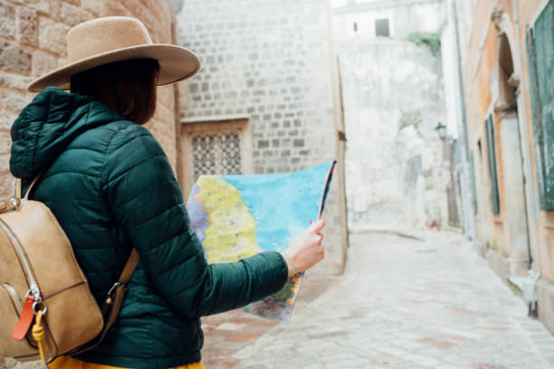 istock Girl looking at the map 1130699947
