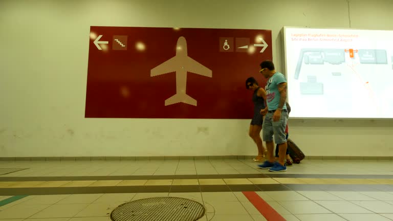 Family at the airport in Summer arriving from holidays