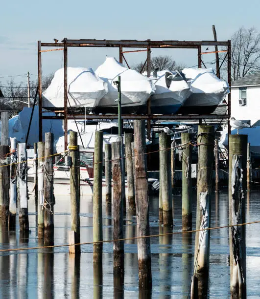 Photo of Boats elevated and shrink wrapped for the winter