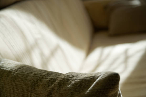 Falling light and shadow on sofa, bedroom background Falling light and shadow on sofa, bedroom background. elefant stock pictures, royalty-free photos & images