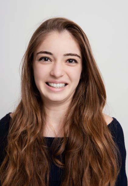 istock Young girl smiling portrait 1130709503