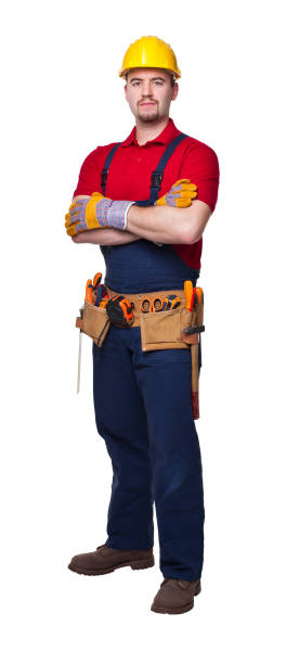 istock Portrait Of Carpenter Standing Against White Background 1130711620