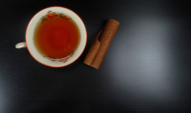 tazza da tè calda porselain in una giornata invernale con cannella - tea jasmine tea green black foto e immagini stock