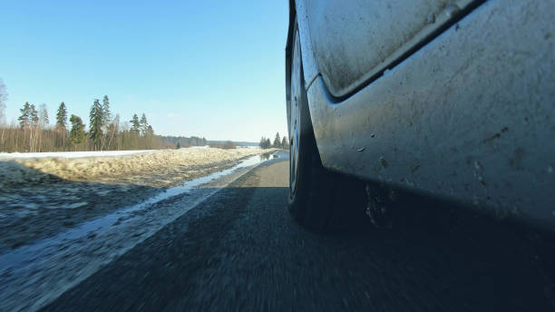istock Driving car on slippery road in winter 1130714989