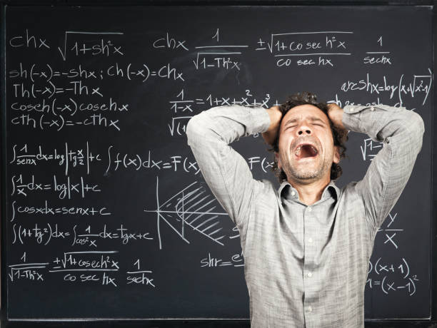 istock Teacher Screaming While Standing Against Blackboard In Classroom 1130715377